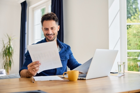 man reviewing documents